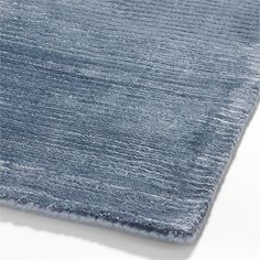 a blue rug on a white background