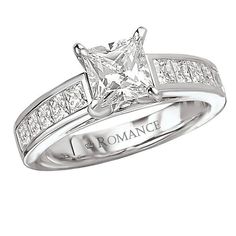 a princess cut diamond engagement ring with channeled shoulders