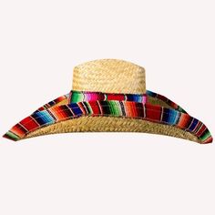 Celebrate Cinco de Mayo in a HUGE way when you add our over sized genuine Mexican sombrero to your party attire. Our natural straw giant Sombrero can be used as a decoration or as a prize at your Cinco de Mayo event or Mexican fiesta. Each sombrero has an impressive 7" front brim, 6" side brims and measures approximately 6"tall. We cannot guarantee the coloring on the natural straw or serape band and trim. One size fits most 6" tall, 6" side brim, 7" front brim Mini Sombrero Hat, Mexican Sombrero, Sombrero Hat, Party Attire, Winter Cap, Over Sized, Wide Brimmed, Straw Hat, Trucker Cap