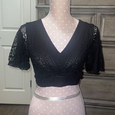 *New,* Never Worn! Size Small Brand: Express Black Lace Crop Top. Ties In Back. Super Cute With Jeans! Black Stretch Lace Crop Top, Elegant Black Short Sleeve Crop Top, Fitted Lace V-neck Crop Top, Black Lace Crop Top, Tops Black, Botanical Pattern, Lace Crop Tops, Black Crop, Black Lace