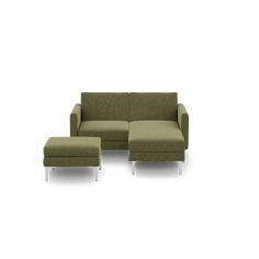 a green couch and footstool sitting next to each other on a white background