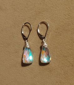 Rainbow quartz earrings dangle approx 1 inch from lobe. Elegant yet sweet these have amazing clarity and cut. Elegant earrings. Matching necklace available as well. Checkout my other (longer) moonstone quartz earrings here: https://www.etsy.com/listing/694597484/long-rainbow-moonstone-quartz-earrings Gold filled Rose gold filled Sterling silver Blue Lace Agate Earrings, Earrings Matching, Larimar Earrings, Rainbow Quartz, Agate Earrings, Blue Lace Agate, Quartz Earrings, Matching Necklaces, Lace Agate