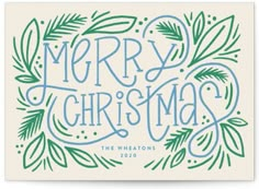 a christmas card with the words merry christmas in blue and green lettering on white paper