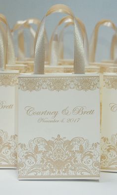 wedding favors are lined up in small bags