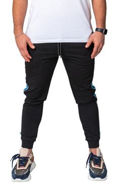 Athleisure is reinvented in these comfy joggers that leave others in the dust with supersoft fleece, bold side stripes and a skinny fit. Elastic/drawstring waist Front scoop pockets 92% cotton, 8% elastane Hand wash, dry flat Made in Turkey Stretch Sweatpants With Side Stripes For Jogging, Black Jogging Sweatpants With Ribbed Cuffs, Black Sweatpants With Ribbed Cuffs For Jogging, Black Sportswear Bottoms With Contrast Stripes, Sporty Joggers With Ribbed Cuffs For Streetwear, Sporty Sweatpants With Athletic Fit, Stretch Joggers With Side Stripes For Jogging, Stretch Pants With Side Stripes For Jogging, Athleisure Joggers With Side Stripes For Loungewear