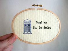 someone is holding up a hand embroidered doctor whos in the tardish hoop