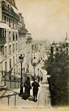 an old photo of people walking down the street