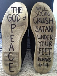 a pair of shoes with words written on them