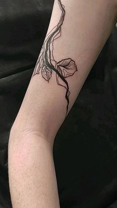 a person with a tattoo on their arm