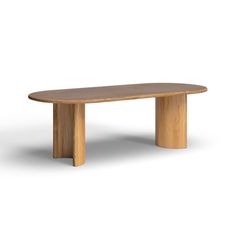 an oval wooden table sitting on top of a white floor