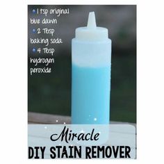 a blue bottle with the words diy stain remover on it and instructions for how to use it