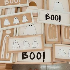 there are many pictures on the floor with words and ghost images in them, including boo