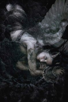 a woman laying on the ground with wings above her head and body, surrounded by darkness