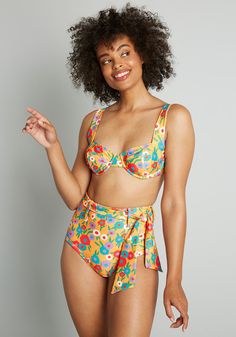 This ModCloth namesake label high-waisted bikini bottom is vintage-inspired perfection, and we are being modest ! Featuring a removable and adjustable tie-belt at the waist and full back coverage, this golden yellow swimsuit bottom boasts a 70’s-inspired floral print in pastel shades of green, red, blue, purple, and pink. You will be finding any excuse to wear this bathing suit bottom while under the sun and in the water thanks to its flattering cut and quirky print. 80% Polyester, 20% Elastane. Vintage Inspired Swimwear, Vintage Style Swimwear, Yellow Swimsuit, Floral Print Swimwear, Retro Bathing Suits, Casual Dresses Plus Size, Yellow Swimsuits, Midi Dress Plus Size, Vintage Swimwear