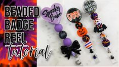 the beaded badge reel is decorated with halloween decorations