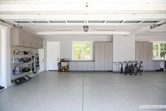 the garage is clean and ready to be used as a storage area for bicycles or other things