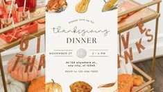 a thanksgiving dinner with pumpkins and gourds