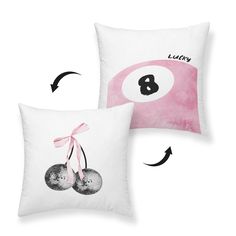 two pillows with pink and white designs on them