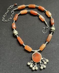 Antique Yemen Necklace w/ an Ancient Carnelian Pendant & Vintage Carnelian Beads  | eBay Silver Carnelian Jewelry Hand-strung, Silver Carnelian Hand-strung Jewelry, Hand-strung Silver Carnelian Jewelry, Antique Orange Jewelry With Natural Stones, Carnelian Pendant, Carnelian Beads, Heart Warming, Yemen, Orange And Yellow