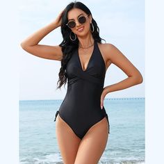 Elevate your swimwear collection with this Women's Halter Swimsuit. This one-piece tankini features a front twist detail and a deep V neckline, creating a stylish and flattering look. The side ruching adds a touch of elegance to the design, making it a perfect choice for your summer 2024 adventures. Crafted from a blend of 82% polyester and 18% spandex, this swimsuit offers a comfortable and stretchy fit that moves with you. Available in three trendy styles and colors: Black, Camouflage Rose, an Beachwear Tankini With Twist Front For Swimming, Solid Swimwear With Twist Front For Vacation, Summer Pool Swimwear With Twist Front, Sleeveless Twist Front Swimwear For Poolside, Fitted Beachwear Swimwear With Twist Front, Fitted Swimwear With Twist Front, Fitted Solid Swimwear With Twist Front, Twist Front Sleeveless Swimwear For Summer, Fitted Twist Front Swimwear For Summer