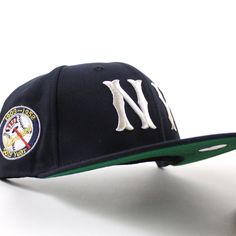 New York Highlanders 50th Year Patch New Era 59Fifty Fitted Hat in Navy and Green Under Brim. The media dubbed the team as "Highlanders", due in part to playing at one of the highest points on Manhattan ("The Hilltop"), which was somewhat higher in altitude than the bulk of Manhattan and was considerably "uphill" from Polo Grounds, Green Bottom, Ny Yankees, New Era Cap, Navy Green, New Era 59fifty, Fitted Caps, Fitted Hat, Navy And Green