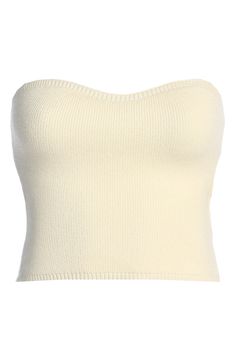 Luminous goldtone seashell hardware on the cutout back brings the beauty of the beach to this soft knit top that's fashioned in a sun-ready strapless design. Sweetheart neck Strapless 52% viscose, 28% polyester, 20% nylon Hand wash, dry flat Imported Chic Fitted Knit Top For Beach, Chic Cream Seamless Tops, Casual Seamless Knit Top For Beach, Ribbed Tops For Beach, Ribbed Tops For The Beach, Beach Beige Knit Crop Top, Seamless Tops For Beach Season, Beige Knit Crop Top For The Beach, Knit Crop Top For Beach