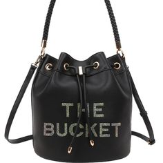 Black The Bucket Bag Black Bucket Bag For On-the-go, On-the-go Black Bucket Bag, Black Bucket Shoulder Bag With Detachable Handle, Trendy Black Bucket Bag With Gold-tone Hardware, Black Bucket-shaped Evening Bag, Black Bucket Shoulder Bag With Dust Bag, Black Bucket-shaped Bags For On-the-go, Trendy Black Bucket Bag With Detachable Handle, Black Bucket Bags For On-the-go