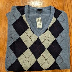 Jos. A. Bank Argyle Sweater. Xxl. Grey Base With Blue And Cream . New With Tags. Winter V-neck Argyle Pattern Top, V-neck Top With Argyle Pattern For Fall, Casual Argyle Pattern Top For Fall, Fall Argyle V-neck Top, Fall V-neck Top With Argyle Pattern, Casual Long Sleeve Argyle Pattern Tops, Casual Long Sleeve Argyle Top, Casual Argyle Pattern Crew Neck Tops, Casual Argyle Crew Neck Tops