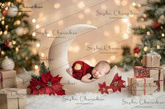 a baby sleeping on the moon surrounded by presents