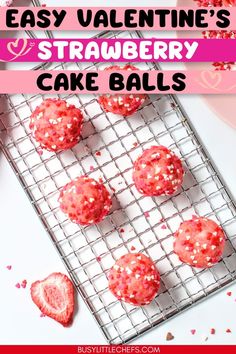 strawberry cake balls on a cooling rack with pink sprinkles