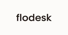 the word floddesk is shown in black on a white background with an orange and