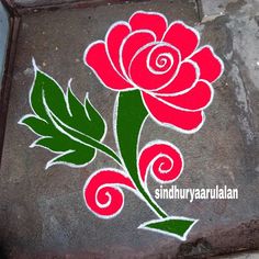 a flower painted on the ground with green leaves and swirls in red, white and green colors