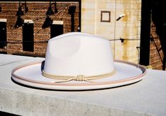 JACKSON - PENCIL BRIM FEDORA HAT - IVORY Cream Fedora Panama Hat For Kentucky Derby, Elegant Cream Panama Hat With Flat Crown, White Flat Crown Fedora For Kentucky Derby, Fitted Cream Panama Hat Fedora, Cream Panama Fedora Hat, Elegant Cream Fedora With Flat Crown, Western White Boater Hat With Flat Crown, Cream Fedora Felt Hat For Kentucky Derby, White Western Boater Hat With Flat Crown