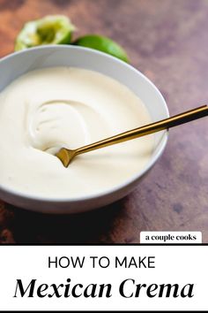 a white bowl filled with cream next to an avocado