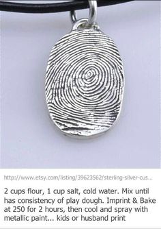 an image of a necklace with a fingerprint on it