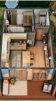 an aerial view of a small house with the kitchen and living room visible from above