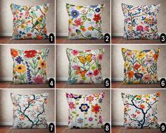 six different pillows with flowers on them