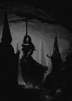 a black and white image of a woman in a dark forest with her arms outstretched