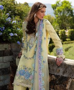 Brand: Republic WomenswearProduct Code: D7-B SylvieCollection: ILANA by Republic Eid Luxury Lawn Unstitched CollectionFabric: Lawn DESCRIPTION: Sylvie, in light yellow, is an embodiment of sophistication, adorned with intricate embroidery in soft hues, framed by hand-finished hem and sleeve details. DESIGN DETAILS: Front Center Embroidered (Jacquard) 1-PC Front Left Embroidered (Jacquard) 1-PC Front Right Embroidered (Jacquard) 1-PC Front Patti Embroidered (Organza) 8-MTR Neckline Embroidered (Organza) 1-PC Hem Border Embroidered (Organza) 1-MTR Back (Jacquard) 1-MTR Sleeves Embroidered (Jacquard) 44"" Sleeves Patti Emboridered-1 (Satin) 1.10-MTR Sleeves Patti Emboridered-2 (Satin) 1.10-MTR Sleeves Patti Emboridered-3 (Organza) 1.10-MTR Dupatta Embroidered (Organza) 2.60-MTR Dupatta Corner Republic Womenswear, Saira Shakira, Pakistani Boutique, Pakistani Designer Clothes, Lawn Dress, Embroidered Organza, Luxury Wear, Basic Wear, Organza Dupatta