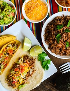 mexican food is laid out on a table