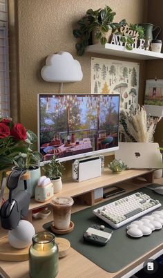 a desk with a computer monitor and keyboard on it