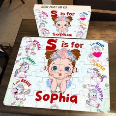 two children's personalized puzzles on a table