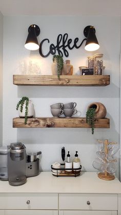 two wooden shelves holding coffee cups and other items on top of a white countertop