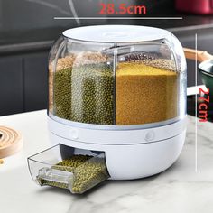 an image of a food dehydrator on the counter with ingredients in it