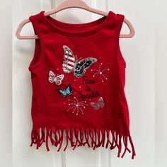 New Without Tags, Has Cute Fringes On The Bottom Red Sleeveless T-shirt For Spring, Cute Red Sleeveless Top, Fun Sleeveless Top For Playtime, Fun Red Sleeveless Top, Red Cotton Top For Playtime, Red Cotton Tops For Playtime, Fun Red Cotton Tops, Red Tops For Spring Playtime, Patriotic Shirts