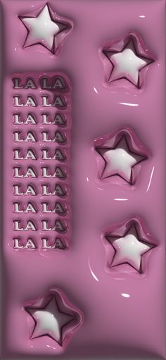 three star shaped chocolate molds with the words la la la la la la on them