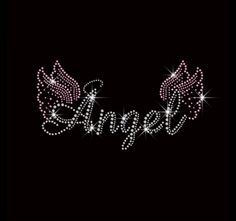 the word angel with wings and sparkles on a black background