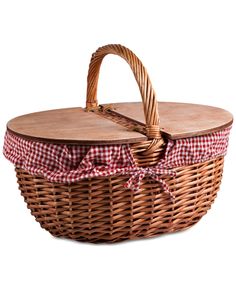 a wicker basket with a red and white checkered cloth on the lid is shown