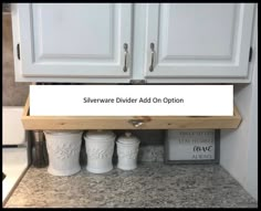 there is a sign that says silverware divider add on option under the cabinet