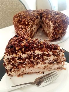 a piece of cake sitting on top of a white plate